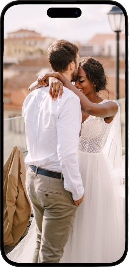 Happy bride and groom hugging